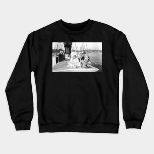 Baby and dog on large boat Crewneck Sweatshirt